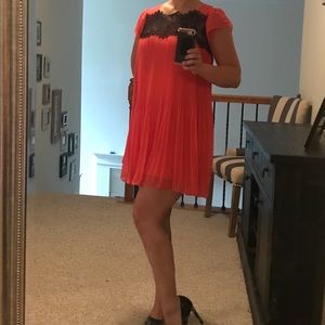 Romeo and Juliet Couture coral and lace dress.